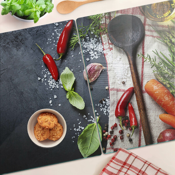 Tagliere in vetro con decorazione a tema spezie e verdure