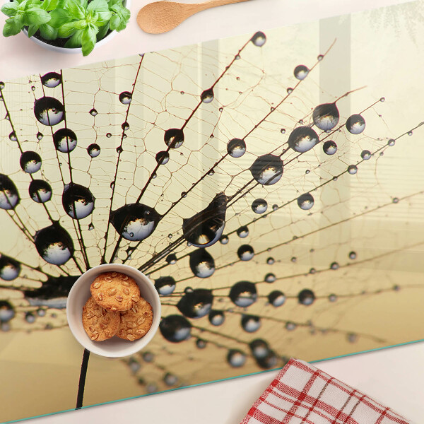 Tagliere in vetro temperato con motivo di gocce d'acqua su ragnatela