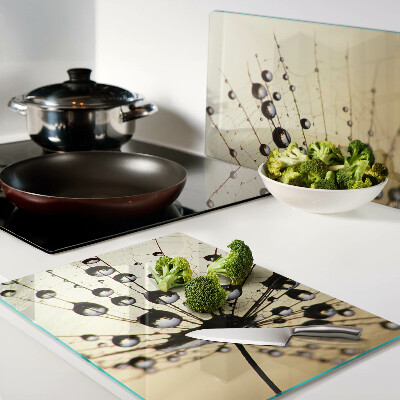 Tagliere in vetro temperato con motivo di gocce d'acqua su ragnatela