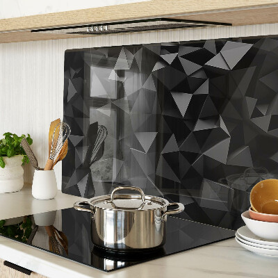 Tagliere in vetro con motivo a poligoni nei toni del nero