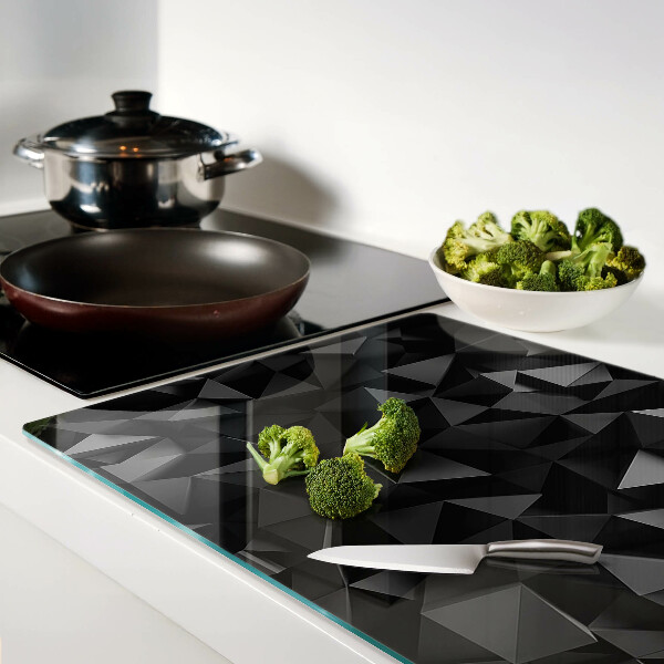Tagliere in vetro con motivo a poligoni nei toni del nero