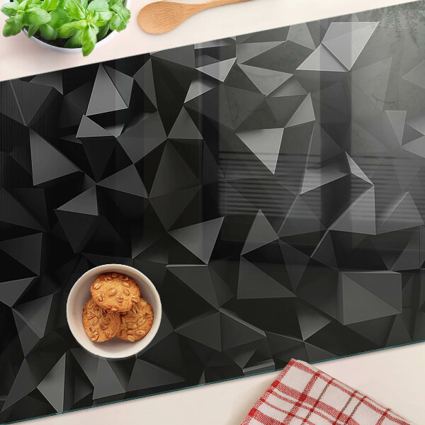Tagliere in vetro con motivo a poligoni nei toni del nero