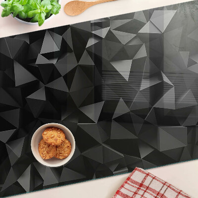 Tagliere in vetro con motivo a poligoni nei toni del nero
