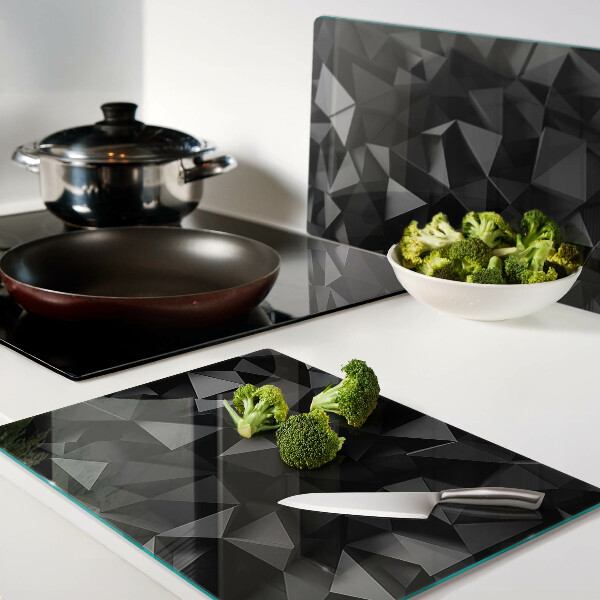 Tagliere in vetro con motivo a poligoni nei toni del nero