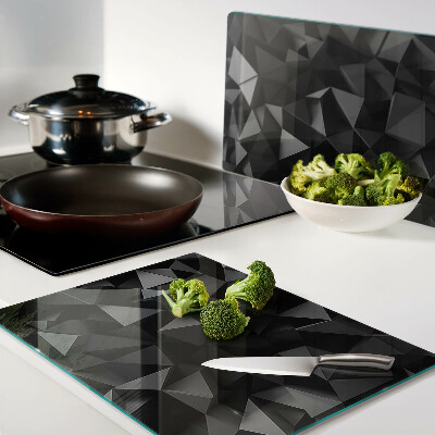 Tagliere in vetro con motivo a poligoni nei toni del nero
