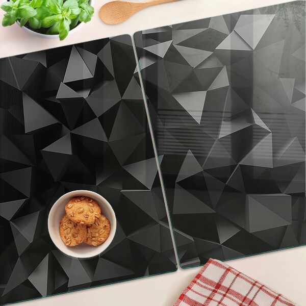 Tagliere in vetro con motivo a poligoni nei toni del nero