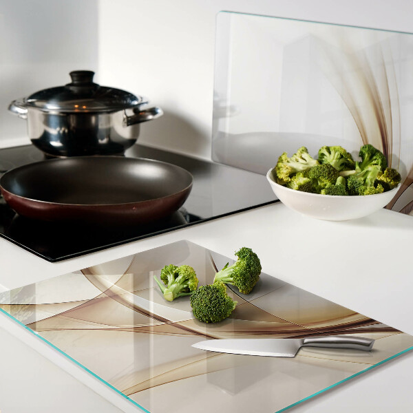 Tagliere in vetro con stampa di onde astratte nei toni del beige