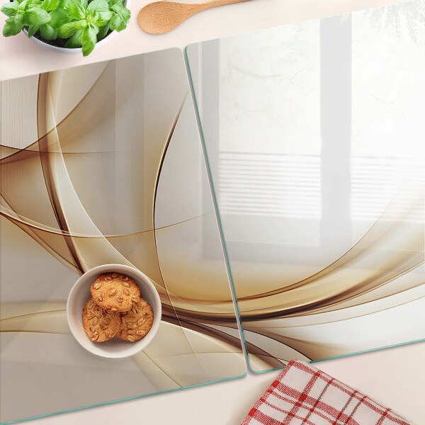 Tagliere in vetro con stampa di onde astratte nei toni del beige
