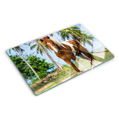 Tagliere in vetro temperato con cavallo su sfondo di palme