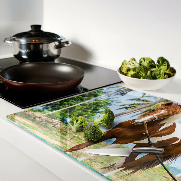 Tagliere in vetro temperato con cavallo su sfondo di palme