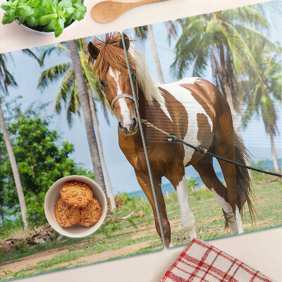 Tagliere in vetro temperato con cavallo su sfondo di palme