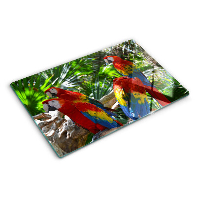 Tagliere in vetro con stampa raffigurante pappagalli in un ambiente tropicale