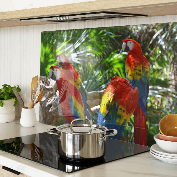 Tagliere in vetro con stampa raffigurante pappagalli in un ambiente tropicale