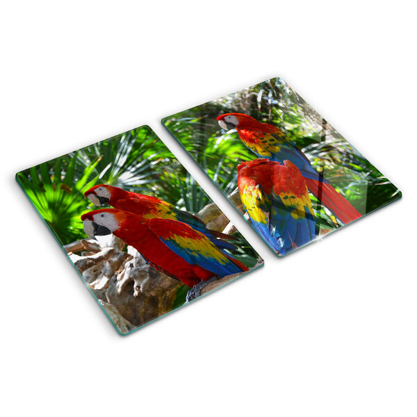 Tagliere in vetro con stampa raffigurante pappagalli in un ambiente tropicale