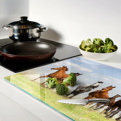 Tagliere in vetro con stampa di cavalli al galoppo sul prato