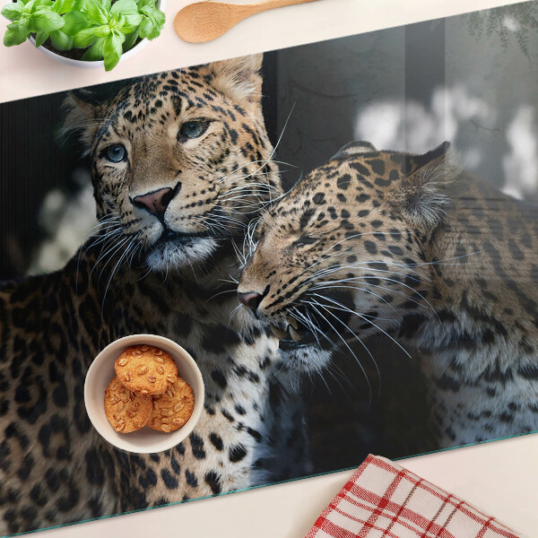 Tagliere in vetro temperato con stampa di ghepardi su sfondo scuro