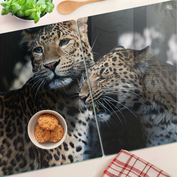 Tagliere in vetro temperato con stampa di ghepardi su sfondo scuro