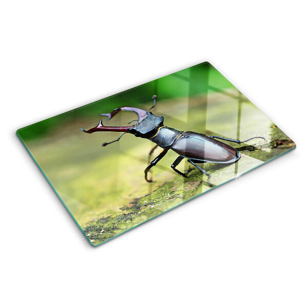 Tagliere in vetro temperato con decorazione raffigurante un cervo maschio su sfondo verde