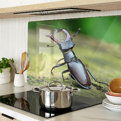 Tagliere in vetro temperato con decorazione raffigurante un cervo maschio su sfondo verde