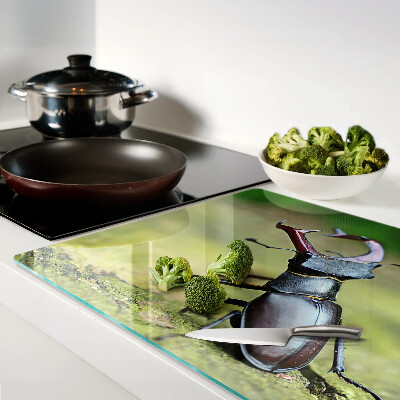 Tagliere in vetro temperato con decorazione raffigurante un cervo maschio su sfondo verde