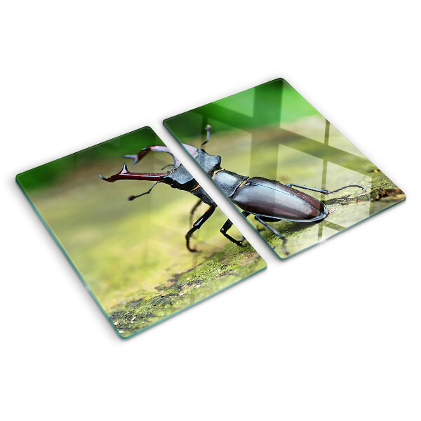 Tagliere in vetro temperato con decorazione raffigurante un cervo maschio su sfondo verde