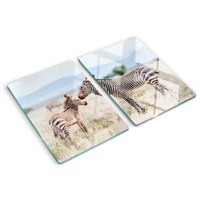 Tagliere in vetro temperato con motivo zebre sul prato