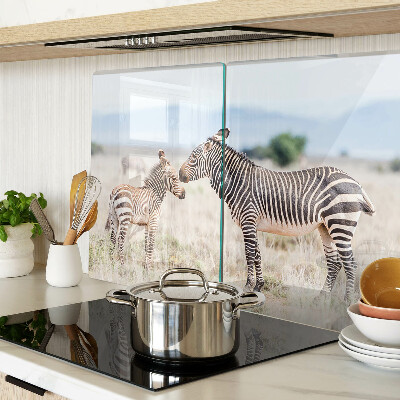 Tagliere in vetro temperato con motivo zebre sul prato