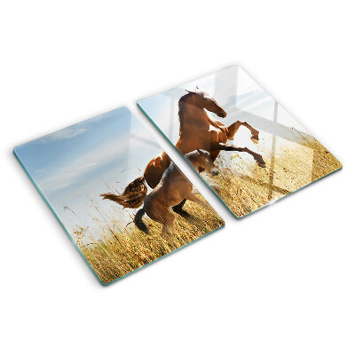 Tagliere in vetro con stampa di cavalli che pascolano al sole