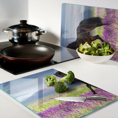 Tagliere in vetro temperato con il disegno di un cavallo su sfondo di fiori viola