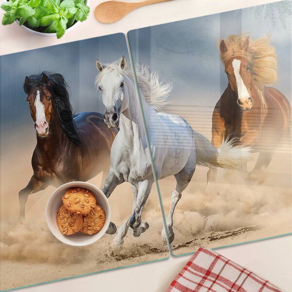 Tagliere in vetro con decorazione raffigurante tre cavalli al galoppo