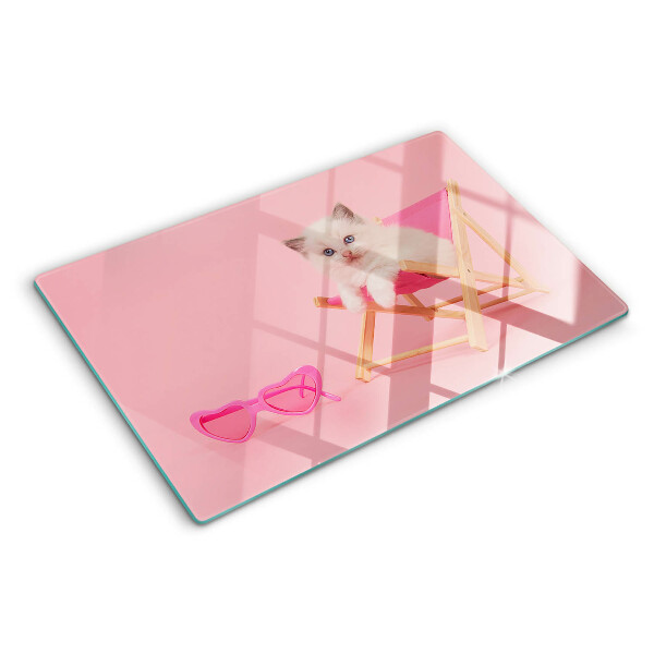 Tagliere in vetro temperato con stampa di un gattino sulla sdraio su sfondo rosa