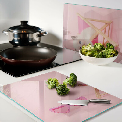 Tagliere in vetro temperato con stampa di un gattino sulla sdraio su sfondo rosa