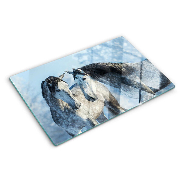 Tagliere in vetro con stampa di cavalli in un paesaggio invernale