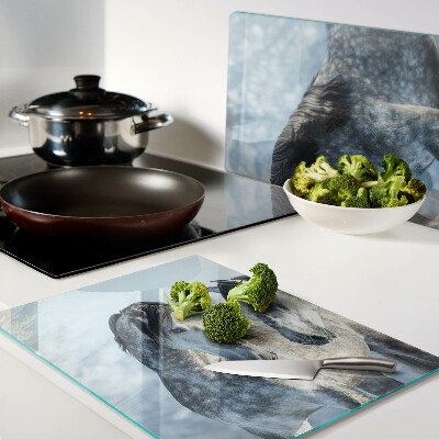 Tagliere in vetro con stampa di cavalli in un paesaggio invernale