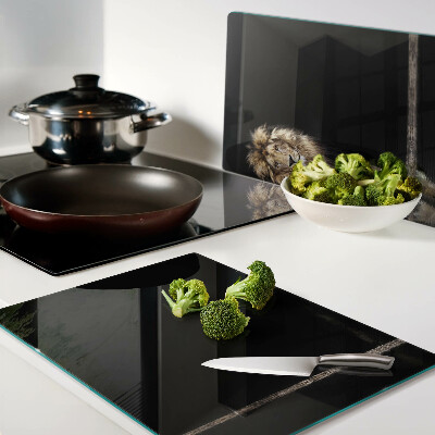 Tagliere in vetro temperato con stampa raffigurante un leone su sfondo scuro