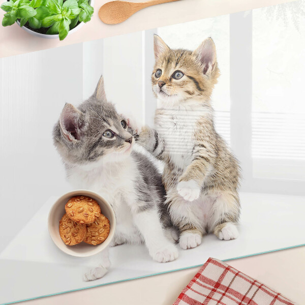 Tagliere in vetro temperato con disegno di gatti su sfondo bianco