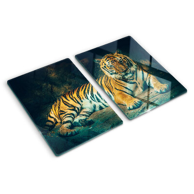 Tagliere in vetro con stampa di una tigre sdraiata sulle rocce