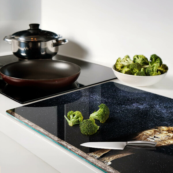 Tagliere in vetro con decorazione a motivo di leone e cielo stellato