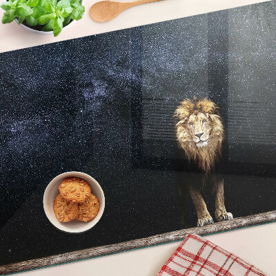 Tagliere in vetro con decorazione a motivo di leone e cielo stellato