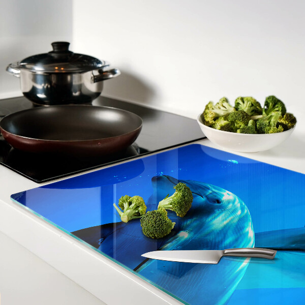 Tagliere in vetro temperato con motivo di delfini nell'acqua