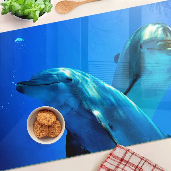 Tagliere in vetro temperato con motivo di delfini nell'acqua