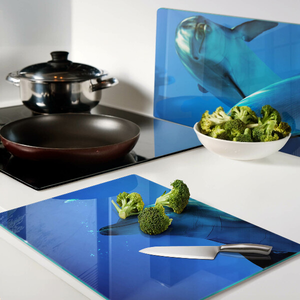 Tagliere in vetro temperato con motivo di delfini nell'acqua