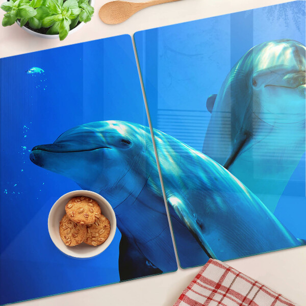 Tagliere in vetro temperato con motivo di delfini nell'acqua