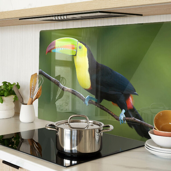 Tagliere in vetro con stampa di un tucano su un ramo