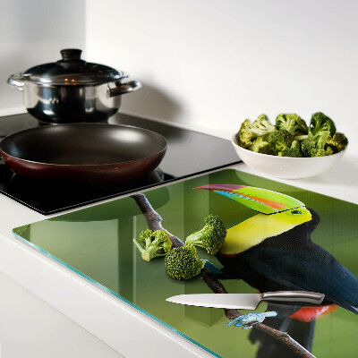 Tagliere in vetro con stampa di un tucano su un ramo