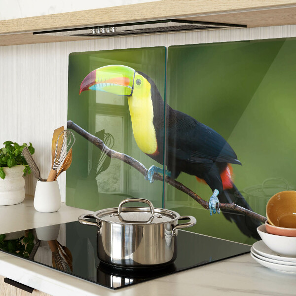 Tagliere in vetro con stampa di un tucano su un ramo