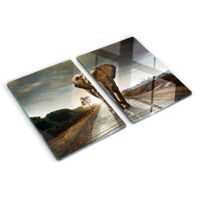 Tagliere in vetro temperato con stampa raffigurante un elefante sulla strada al tramonto