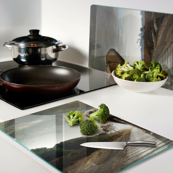 Tagliere in vetro temperato con stampa raffigurante un elefante sulla strada al tramonto