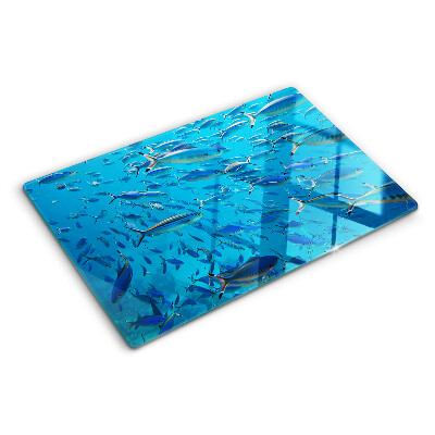 Tagliere in vetro temperato con decorazione raffigurante un banco di pesci sull'acqua