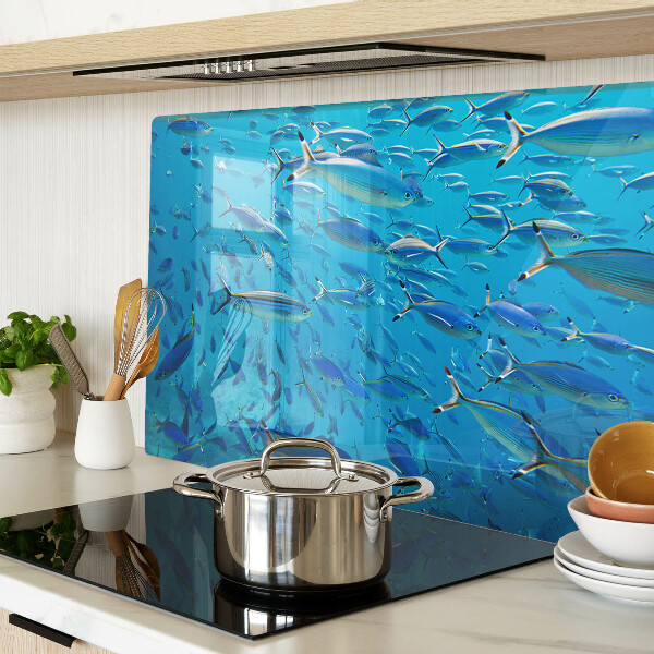 Tagliere in vetro temperato con decorazione raffigurante un banco di pesci sull'acqua